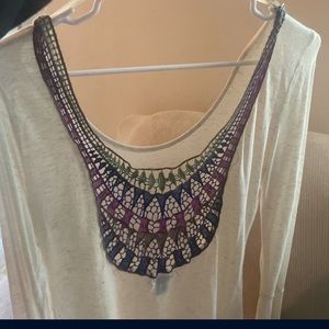 Woman’s beige shirt